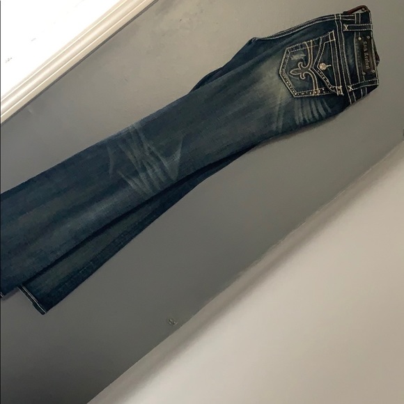 a pair of rock revival jeans - Picture 2 of 6
